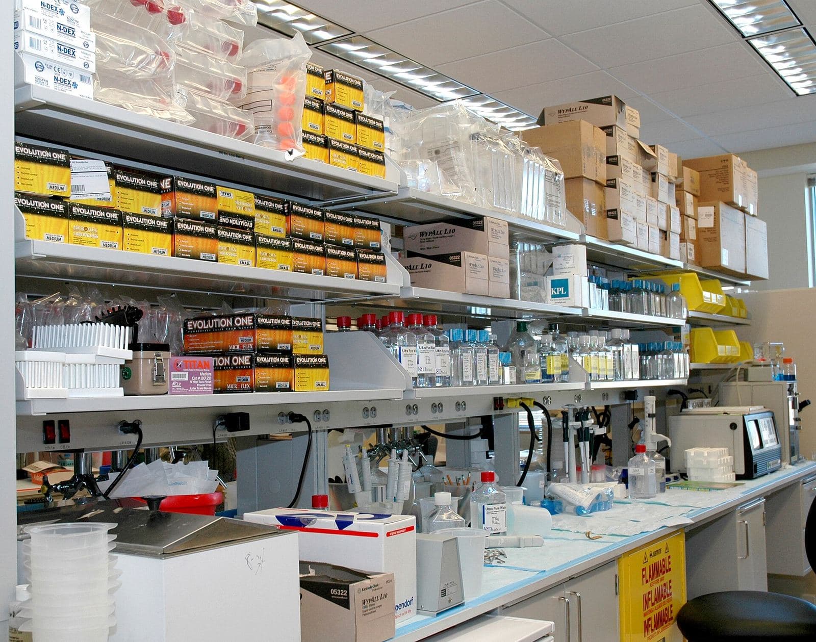 Laboratory shelves stocked with reagents and equipment at the NIH